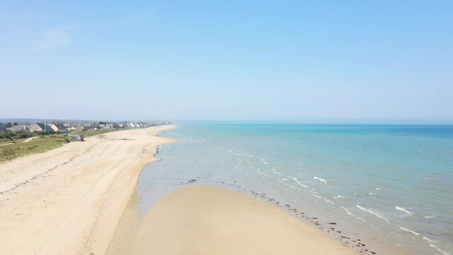 The large sandy beach of Utah beach in Europe, France, Normandy, towards Carentan, in spring, on a sunny day.