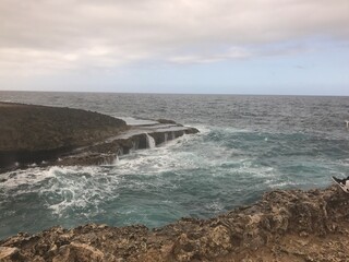 waves crashing on rocks