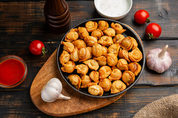 Oriental Fried Dumplings with Minced Meat also known as Gyoza, Dim Sum, Jiaozi, Momo, Tortellini,