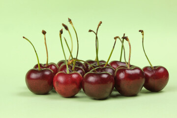 Sweet cherry isolated on green