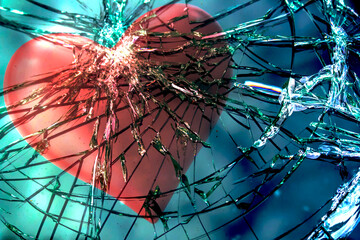 Heart background on broken glass