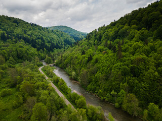 Fototapeta na wymiar Road Trough Bieszczady Mountains Park. Drone View