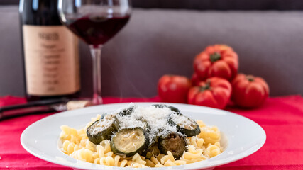 Italian food: pasta with zucchini and parmesan