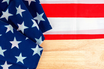 Flag of the American on wooden background