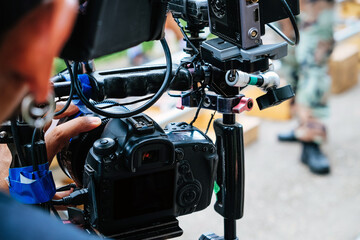Fototapeta na wymiar detail of Video camera , film crew production, behind the scenes background