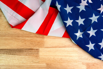 Fototapeta na wymiar Flag of the American on wooden background.