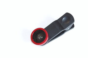 Mobile photography tools phone lens and clip isolated on a white background.