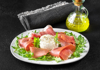 Antipasto with prosciutto and mozzarella
