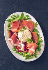 Antipasto with prosciutto and mozzarella