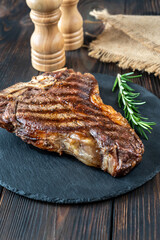 Grilled T-bone steak with fresh rosemary