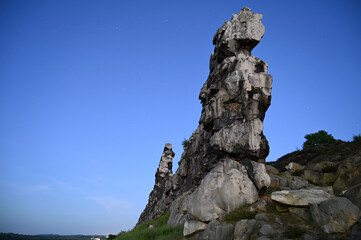 Twilight at the Devil's wall (in German: Teufelsmauer), a natural rock formation located between Neinstedt and Weddersleben in the Harz National Park (Germany)