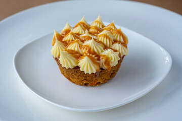 Carrot cake on white plate
