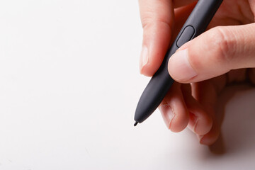 hand with digitalpen or mouse pen