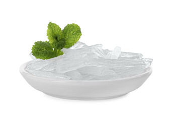 Menthol crystals and fresh mint leaves in bowl on white background
