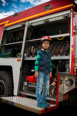 Boy on fire truck