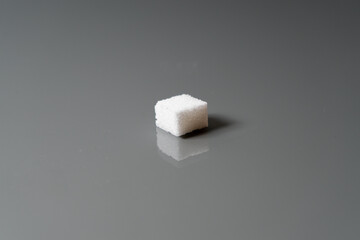 Sugar cubes in different arrangements and colored light. Bavaria Germany . Arrow, Pile, Cube, Square,