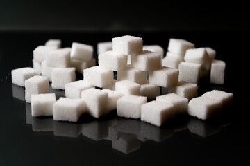 Sugar cubes in different arrangements and colored light. Bavaria Germany . Arrow, Pile, Cube, Square,