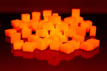 Sugar cubes in different arrangements and colored light. Bavaria Germany . Arrow, Pile, Cube, Square,