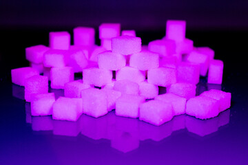 Sugar cubes in different arrangements and colored light. Bavaria Germany . Arrow, Pile, Cube,...