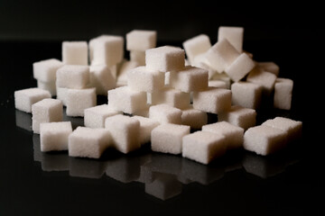 Sugar cubes in different arrangements and colored light. Bavaria Germany . Arrow, Pile, Cube, Square,