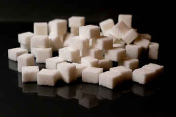 Sugar cubes in different arrangements and colored light. Bavaria Germany . Arrow, Pile, Cube,...