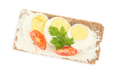 Fresh rye crispbread with boiled egg, cream cheese and tomato isolated on white, top view