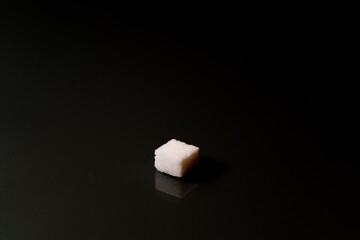 Sugar cubes in different arrangements and colored light. Bavaria Germany . Arrow, Pile, Cube, Square,
