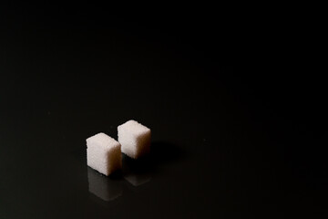Sugar cubes in different arrangements and colored light. Bavaria Germany . Arrow, Pile, Cube,...