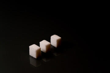 Sugar cubes in different arrangements and colored light. Bavaria Germany . Arrow, Pile, Cube,...