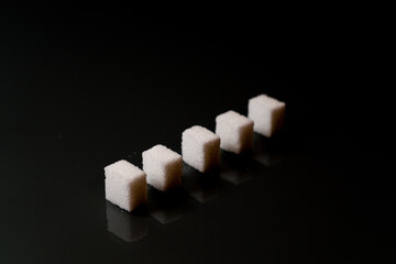 Sugar cubes in different arrangements and colored light. Bavaria Germany . Arrow, Pile, Cube, Square,