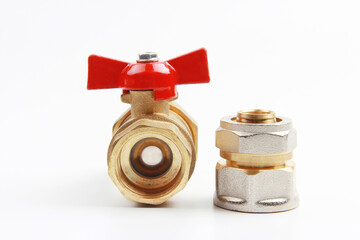 New brass water tap with adapter on white background. The concept of repair and connection of...