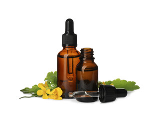Bottles of essential oil, pipette and celandine on white background