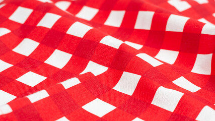 Red napkin isolated on white background.