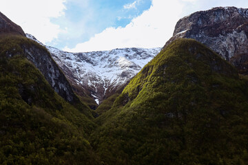 Obraz premium Snow capped mountains at spring in Nærøyfjord, Norway