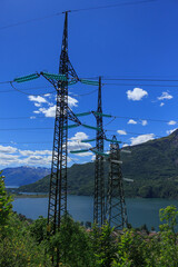 Obraz premium Power lines high in the mountains