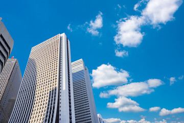 Obraz na płótnie Canvas Buildings and blue sky.　ビル街と青空