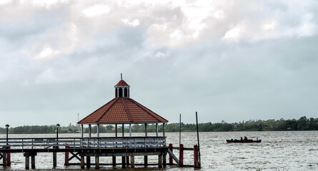 Pier on the Suriname River behind the Hotel Torarica in the capital city of Paramaribo Suriname