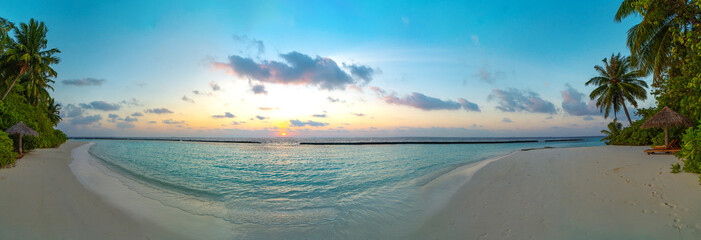 Amazing wide panorama of tropical Maldives island. Exotic beach background with blue lagoon,...