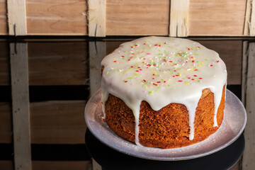 carrot cake tart with cheese cream topping. horizontal shot