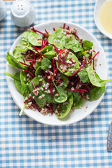Bulgur, beetroot and spinach salad with vinaigrette sauce. 