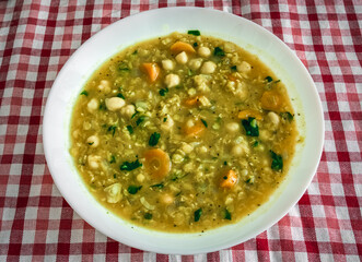 Homemade vegan soup with red lentils and chickpeas