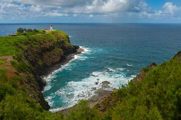 Fototapeta premium Kilauea Lighthouse, Kauai, Hawaii. Kīlauea Lighthouse is located on Kīlauea Point on the island of Kauaʻi, Hawaiʻi in the Kīlauea Point National Wildlife Refuge. A popular place for bird watching.