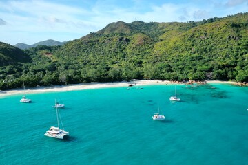 Aerial view of a luxury yacht vacation. Nature background. Praslin island, Seychelles
