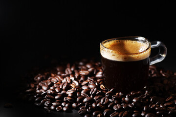 A cup with black coffee	
