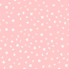 Pattern with leaves on a pink-peach background. Vector image.