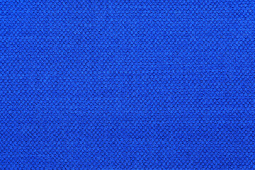 Blue fabric background and texture with copy space, view from above