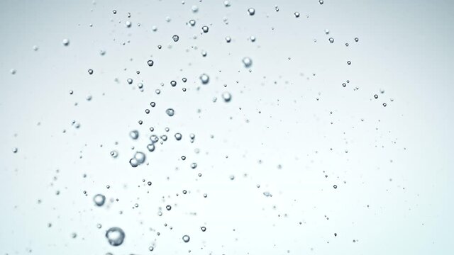 Super Slow Motion Shot of Rising Various Bubbles in Water at 1000 fps.