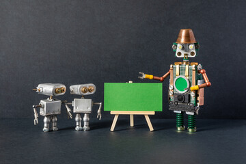 Three robots are making a presentation. Paper placard poster green color, copy space for text or...