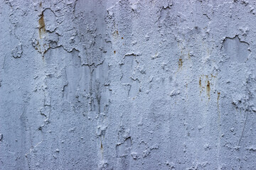 Texture of a gray paint ragged metal wall of a naval warship.