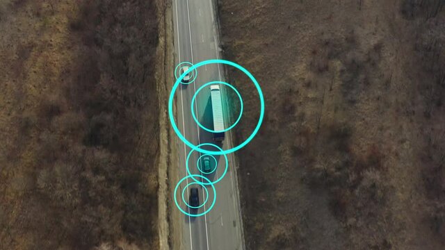 Logistics concept, traffic tracking, Internet of Things: Car traffic - Plenty of cars on the freeway with VFX graphics: tracking cars and trucks on the road. IOT Road Concept.